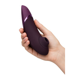 Stimulateur Womanizer Next Violet invitant à des sommets de jouissance aérienne intense