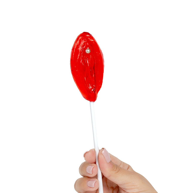 Sucette vulve fraise libérant arômes sucrés et forme ludique provocante