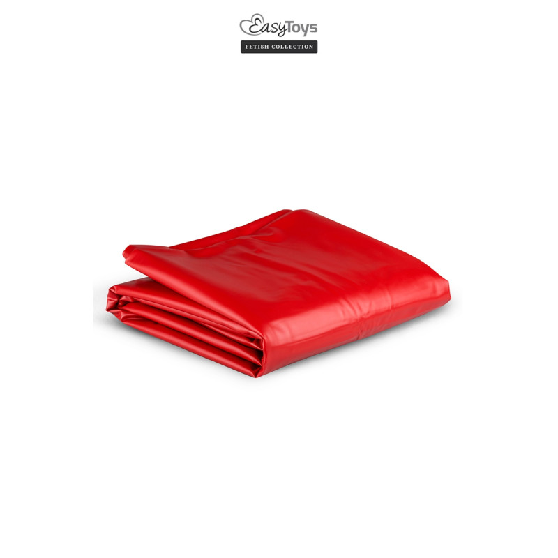 Drap vinyle rouge pour protéger le lit lors de jeux coquins salissants