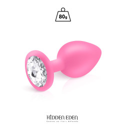 Plug bijou silicone rose L Hidden Eden posé sur fond blanc, strass transparent en évidence