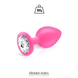 Plug bijou silicone rose M Hidden Eden posé sur fond clair, strass cristal en évidence