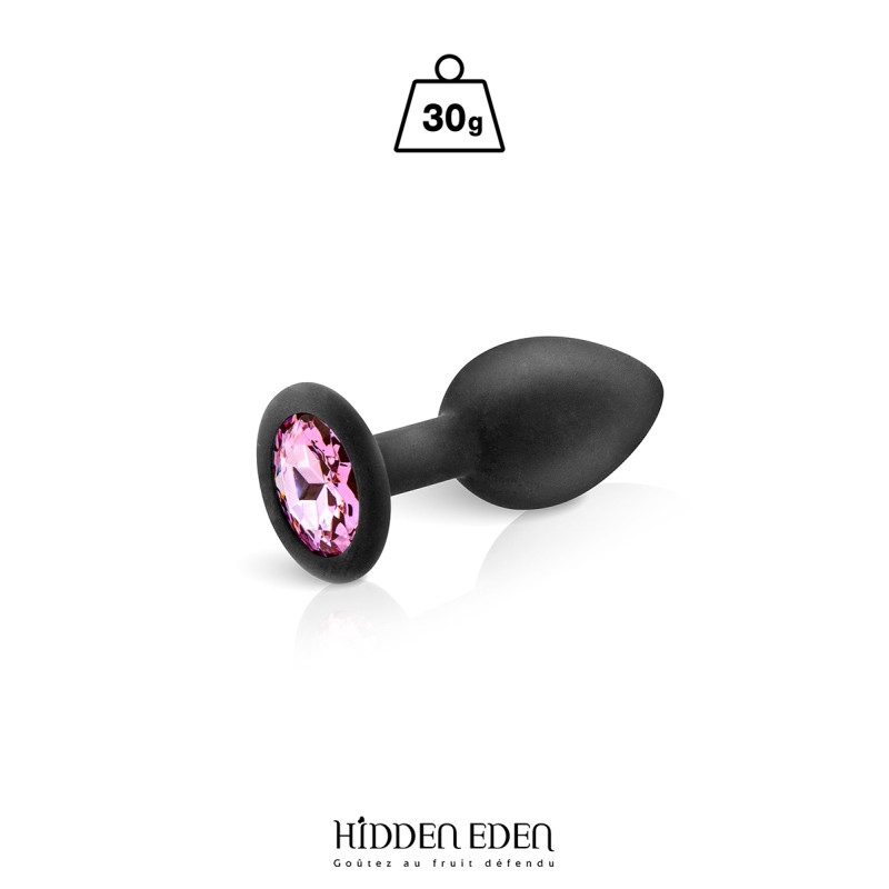 Plug bijou silicone noir S Hidden Eden posé sur fond clair, strass rose en évidence