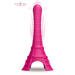 Vibromasseur La Tour Est Folle rose posé sur surface claire, allure moderne et ergonomique.