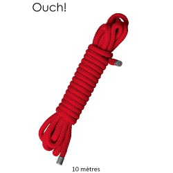 Corde de bondage Japonais 10m rouge Ouch, la corde de couleur rouge enroulée sur elle-même.