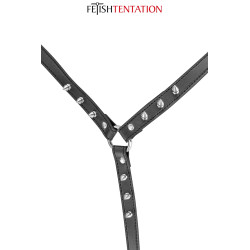 Harnais buste à pointes Fetish Tentation, gros plan sur les pointes métalliques des sangles.